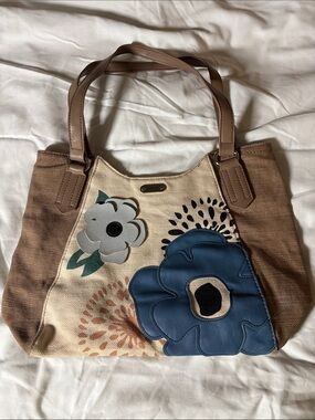Relic Beige Canvas Tote with Brown Trim and Blue Floral Appliqué
